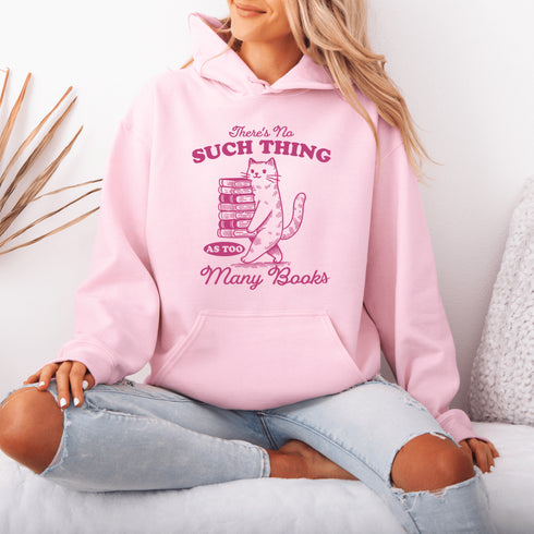 Introducing the purr-fect hoodie for book lovers and feline fanatics! Featuring a scholarly kitty confidently balancing a teetering tower of books