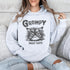 Introducing the "Grumpy Most Days" Hoodie—because let's face it, some days just require a permanent scowl. Featuring the grumpiest cat you’ve ever seen, this hoodie is perfect for those days when coffee, sunshine, or people just aren't cutting it.