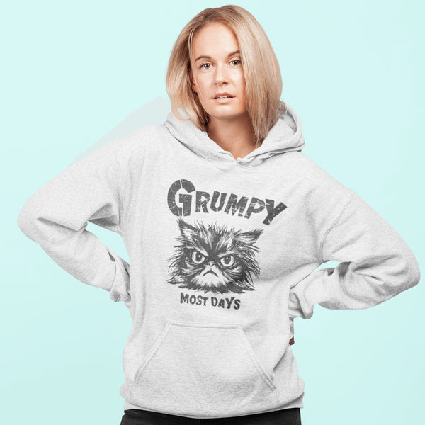 Introducing the "Grumpy Most Days" Hoodie—because let's face it, some days just require a permanent scowl. Featuring the grumpiest cat you’ve ever seen, this hoodie is perfect for those days when coffee, sunshine, or people just aren't cutting it.