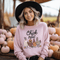Get ready to ruffle some feathers with the Chick or Treat sweatshirt! Featuring a flock of adorable cartoon chickens dressed up for Halloween, these little cluckers are out for more than just corn this year—they're here for candy!