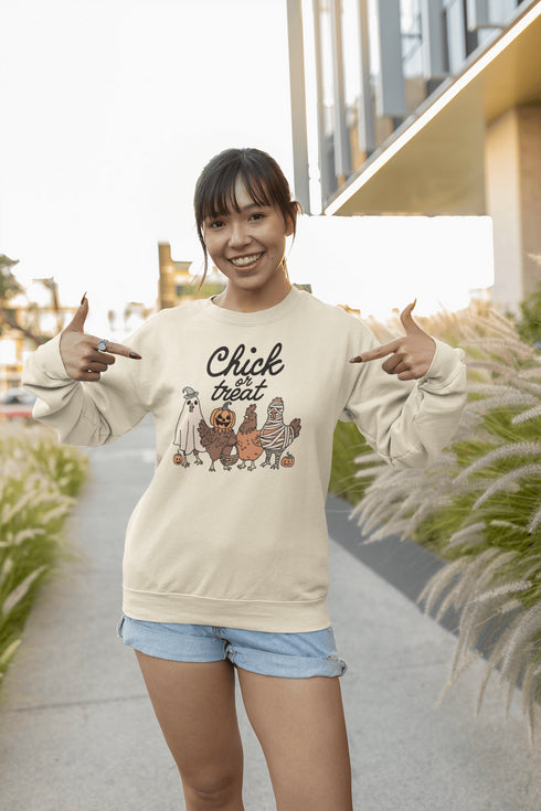 Get ready to ruffle some feathers with the Chick or Treat sweatshirt! Featuring a flock of adorable cartoon chickens dressed up for Halloween, these little cluckers are out for more than just corn this year—they're here for candy!