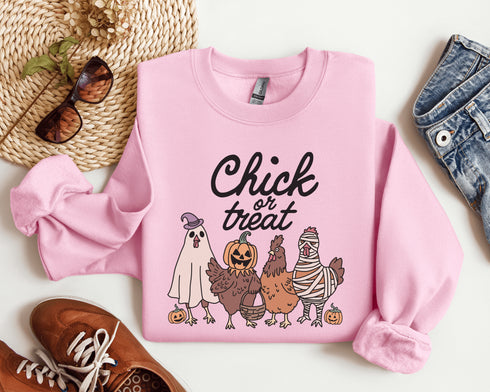 Get ready to ruffle some feathers with the Chick or Treat sweatshirt! Featuring a flock of adorable cartoon chickens dressed up for Halloween, these little cluckers are out for more than just corn this year—they're here for candy!