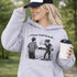 Funny soccer hoodie with “Classy Until Kickoff” text and illustration of woman yelling at referee on soccer field