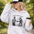 Funny soccer hoodie with “Classy Until Kickoff” text and illustration of woman yelling at referee on soccer field