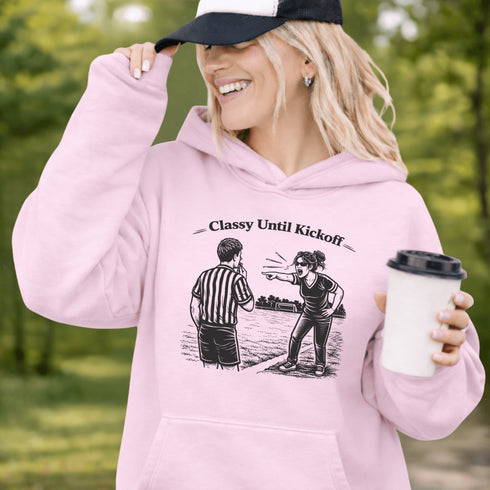 Funny soccer hoodie with “Classy Until Kickoff” text and illustration of woman yelling at referee on soccer field