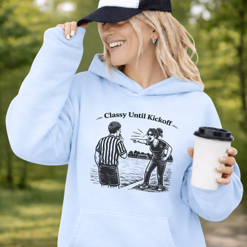 Funny soccer hoodie with “Classy Until Kickoff” text and illustration of woman yelling at referee on soccer field