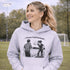 Funny soccer hoodie with “Classy Until Kickoff” text and illustration of woman yelling at referee on soccer field