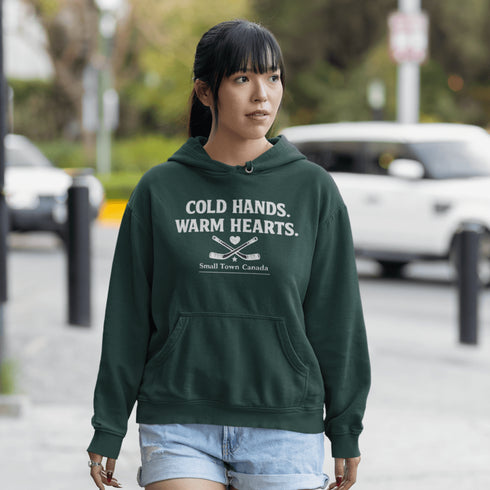 Outdoor hockey hoodie celebrating small town rink life. Cozy fleece sweatshirt perfect for skating, shinny nights, and Canadian winter traditions.