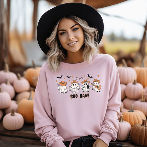 Featuring a posse of cartoon ghosts decked out in cowboy hats, boots, and even a few lasso tricks, this sweatshirt is perfect for haunting the Wild West in style.