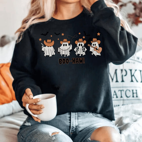 Featuring a posse of cartoon ghosts decked out in cowboy hats, boots, and even a few lasso tricks, this sweatshirt is perfect for haunting the Wild West in style.