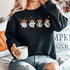 Featuring a posse of cartoon ghosts decked out in cowboy hats, boots, and even a few lasso tricks, this sweatshirt is perfect for haunting the Wild West in style.