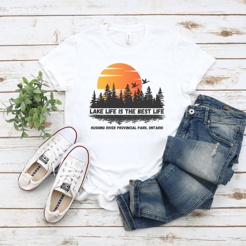 Introducing our exclusive collection of customizable lake-themed t-shirts, featuring breathtaking scenes from the iconic lakes of Manitoba and Ontario. Each shirt in this collection is a canvas for the serene beauty and tranquil waters that these provinces are renowned for.