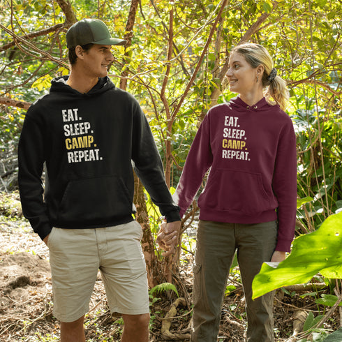 Introducing the ultimate camper's companion: the "Eat. Sleep. Camp. Repeat." Hoodie! This isn't just any ordinary piece of clothing. It's your best friend in the wilderness, your cozy confidante under the stars, and quite possibly the most honest representation of your weekend plans.