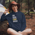 Introducing the ultimate camper's companion: the "Eat. Sleep. Camp. Repeat." Hoodie! This isn't just any ordinary piece of clothing. It's your best friend in the wilderness, your cozy confidante under the stars, and quite possibly the most honest representation of your weekend plans.