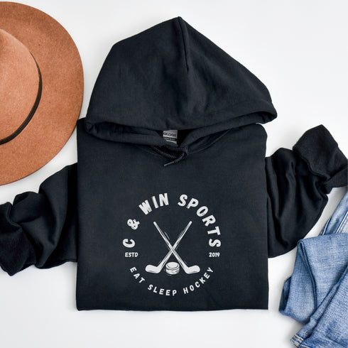 Introducing our Eat Sleep Hockey Hoodie, the perfect apparel for all hockey enthusiasts out there! Whether you're a player, a fan, or simply love the sport, this hoodie is a must-have addition to your wardrobe.