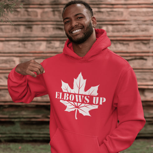 Featuring a bold maple leaf and the iconic "Elbows Up" phrase, this hoodie lets everyone know you’re not afraid to play hard—on the ice, in life
