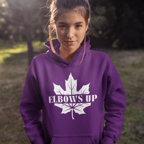 Featuring a bold maple leaf and the iconic "Elbows Up" phrase, this hoodie lets everyone know you’re not afraid to play hard—on the ice, in life