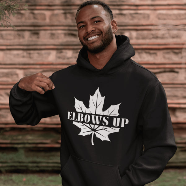 Featuring a bold maple leaf and the iconic "Elbows Up" phrase, this hoodie lets everyone know you’re not afraid to play hard—on the ice, in life
