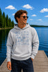 Customizable Lake Life hoodie featuring lake-themed illustrations including a dock, canoe, sailboat, campfire, fishing gear, and personalized lake name design on a unisex Gildan 18500 hoodie available in multiple colors.