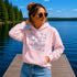 Customizable Lake Life hoodie featuring lake-themed illustrations including a dock, canoe, sailboat, campfire, fishing gear, and personalized lake name design on a unisex Gildan 18500 hoodie available in multiple colors.