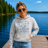 Customizable Lake Life hoodie featuring lake-themed illustrations including a dock, canoe, sailboat, campfire, fishing gear, and personalized lake name design on a unisex Gildan 18500 hoodie available in multiple colors.