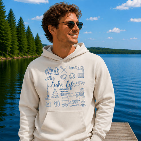 Customizable Lake Life hoodie featuring lake-themed illustrations including a dock, canoe, sailboat, campfire, fishing gear, and personalized lake name design on a unisex Gildan 18500 hoodie available in multiple colors.