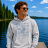 Customizable Lake Life hoodie featuring lake-themed illustrations including a dock, canoe, sailboat, campfire, fishing gear, and personalized lake name design on a unisex Gildan 18500 hoodie available in multiple colors.