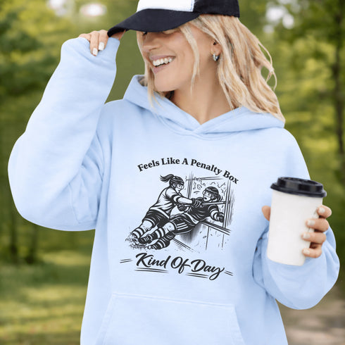funny hockey hoodie with feels like a penalty box kind of day design featuring players crashing into boards on light blue hoodie