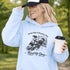 funny hockey hoodie with feels like a penalty box kind of day design featuring players crashing into boards on light blue hoodie