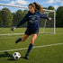 Person in a soccer goalkeeping outfit on a soccer field with a hoodie text.