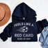 Navy blue hoodie with text and soccer ball graphic on a white background
