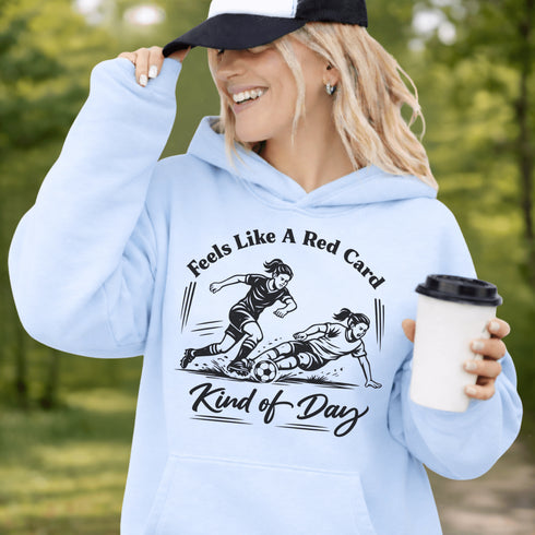 Woman wearing hoodie with funny soccer graphic and text feels like a red card kind of day