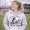 Woman wearing hoodie with funny soccer graphic and text feels like a red card kind of day