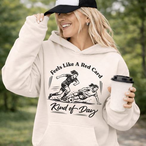 Woman wearing hoodie with funny soccer graphic and text feels like a red card kind of day