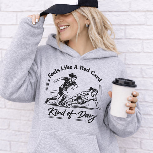 Woman wearing hoodie with funny soccer graphic and text feels like a red card kind of day
