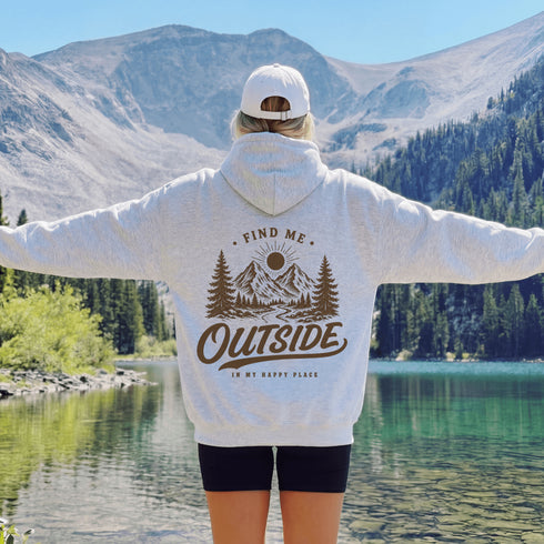 Vintage outdoor graphic hoodie featuring a small left chest design and a large mountain landscape graphic on the back, available in multiple colors and shown in various lifestyle and product mockups.
