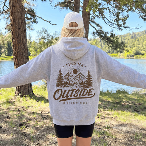 Vintage outdoor graphic hoodie featuring a small left chest design and a large mountain landscape graphic on the back, available in multiple colors and shown in various lifestyle and product mockups.