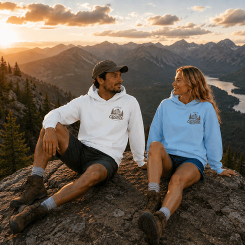 Vintage outdoor graphic hoodie featuring a small left chest design and a large mountain landscape graphic on the back, available in multiple colors and shown in various lifestyle and product mockups.