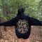 Featuring the bold phrase "Find Your Wild" crafted in a unique tree branch letter font, this hoodie is a celebration of the untamed beauty of the forest and the freedom it inspires.