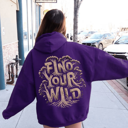 Featuring the bold phrase "Find Your Wild" crafted in a unique tree branch letter font, this hoodie is a celebration of the untamed beauty of the forest and the freedom it inspires.
