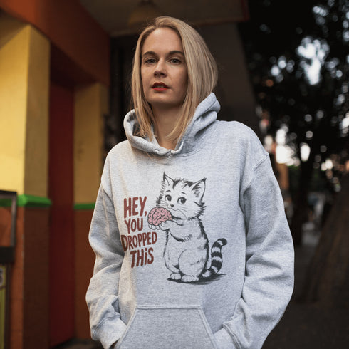 This hoodie is for the sharp-witted and sarcastically inclined. Featuring a cat that’s equal parts adorable and unsettling, it’s holding a brain in its paws.