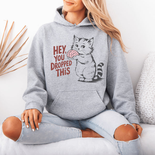 This hoodie is for the sharp-witted and sarcastically inclined. Featuring a cat that’s equal parts adorable and unsettling, it’s holding a brain in its paws.
