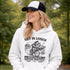 Funny soccer hoodie design showing two kids riding a bike to soccer practice with the phrase get in loser we’re late for soccer practice