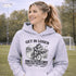 Funny soccer hoodie design showing two kids riding a bike to soccer practice with the phrase get in loser we’re late for soccer practice