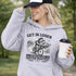 Funny soccer hoodie design showing two kids riding a bike to soccer practice with the phrase get in loser we’re late for soccer practice