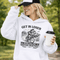 Funny soccer hoodie design showing two kids riding a bike to soccer practice with the phrase get in loser we’re late for soccer practice