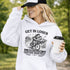 Funny soccer hoodie design showing two kids riding a bike to soccer practice with the phrase get in loser we’re late for soccer practice