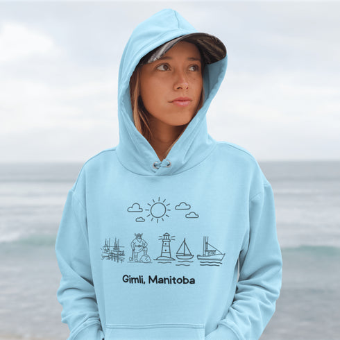 Celebrate the charm of lake life with our Gimli Doodle hoodie — a cozy tribute to Manitoba’s iconic lakeside town.