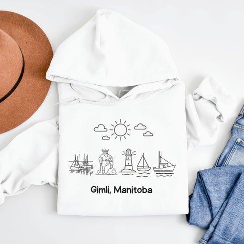 Celebrate the charm of lake life with our Gimli Doodle hoodie — a cozy tribute to Manitoba’s iconic lakeside town.