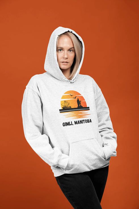 Featuring a sunset backdrop over the charming town of Gimli, Manitoba, with the iconic Viking statue front and center, this hoodie is your stylish ticket to Viking vibes without having to set sail.